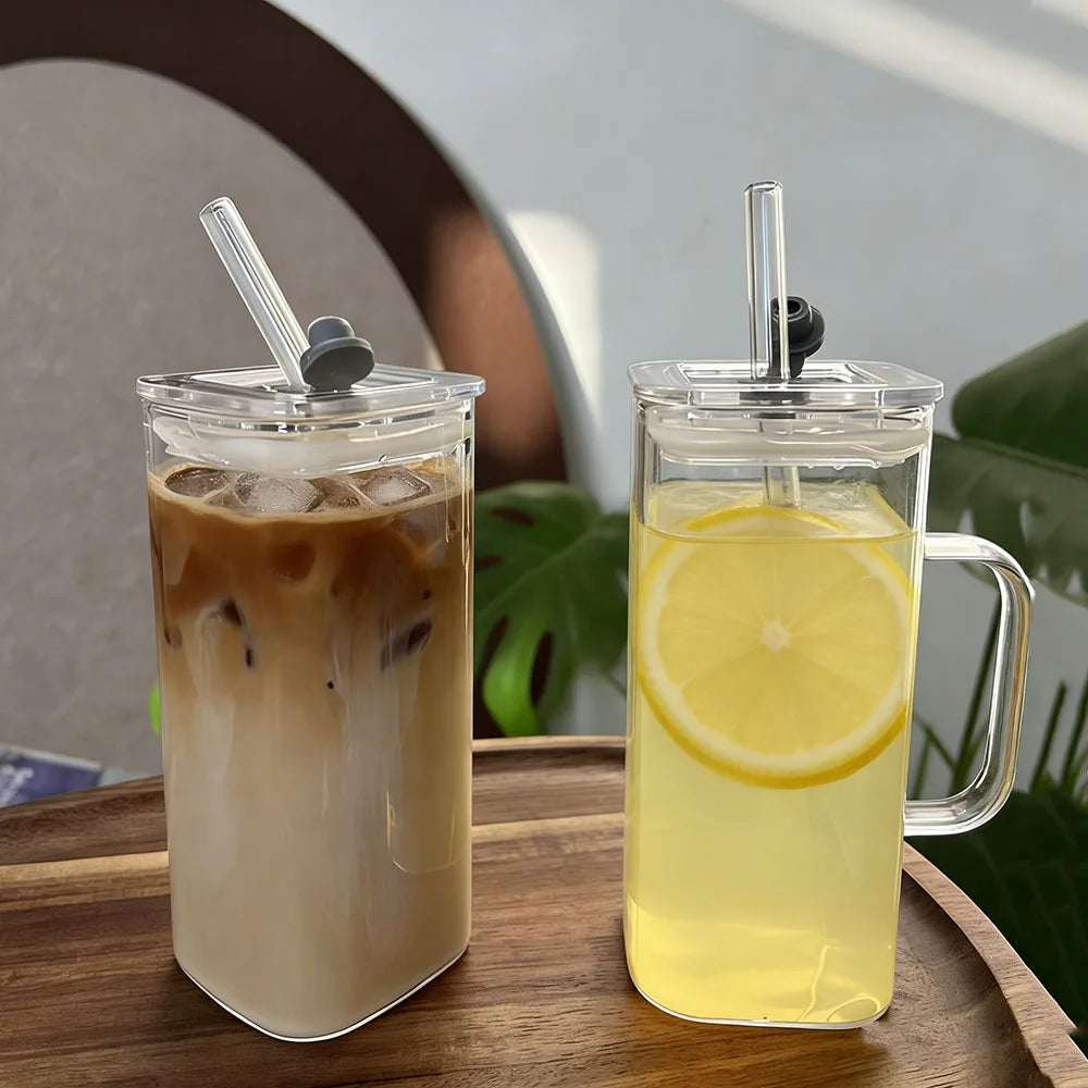 A tall glass mug filled with iced tea or lemonade sits on a wooden tray.