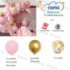 A pink balloon garland decoration featuring various sized balloons and a gold arch setup for parties.