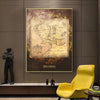 Vintage retro world map canvas wall art framed in gold on a dark gray wall.