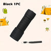 Black 1PC compact flashlight with a lanyard and various camping items shown around it.