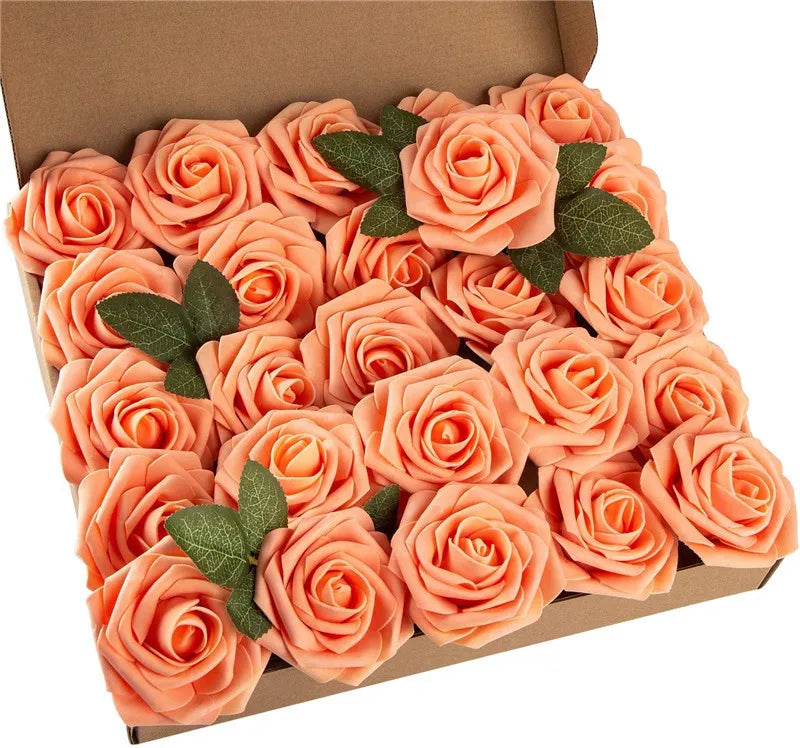 A box filled with realistic orange foam rose artificial flowers with green leaves.