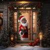 A festive display featuring a Santa figure in a red suit framed by a green garland and Christmas decorations on a wooden door