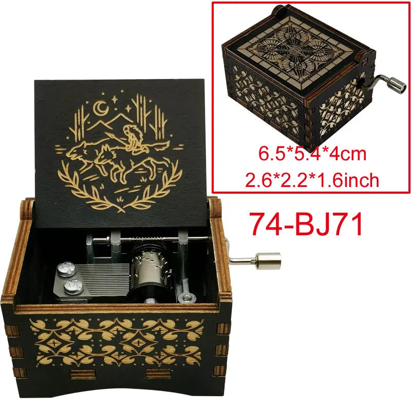 A wooden music box with a lid featuring an illustrated deer and foliage, showing the interior mechanism.