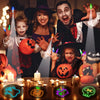 A family of four posing with glowing Halloween LED finger projectors and pumpkin designs