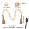 A set of double-ended marker pens with wooden beads and tassels for DIY crafts.