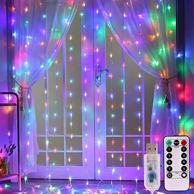 Purple and green fairy lights draped across a glass door with a remote control switch visible.