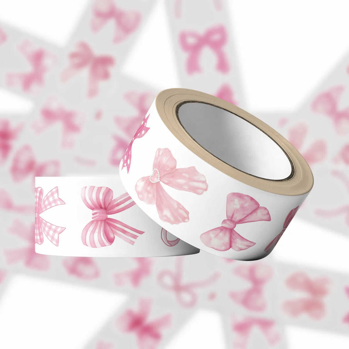 A roll of pink decorative envelopes featuring cartoon bows and stickers on a white background.