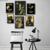A gallery wall display featuring several black and white posters of Tupac Shakur.
