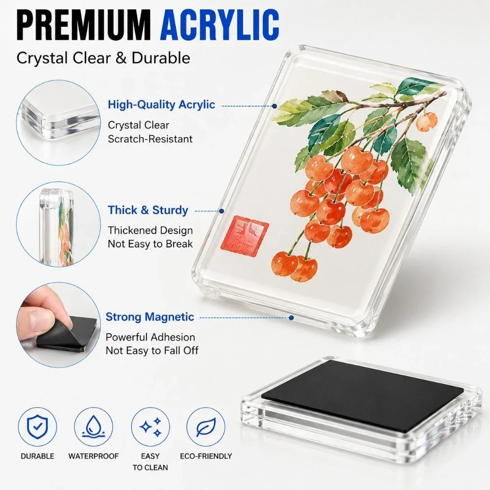 A clear acrylic fridge magnet featuring an orange-colored branch and leaves on a white background.