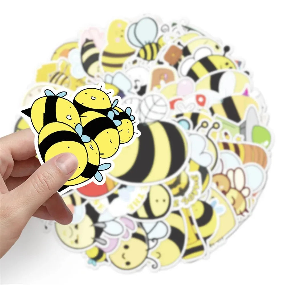 A hand holds a circular sticker pack featuring cartoon bee decals on a white background.
