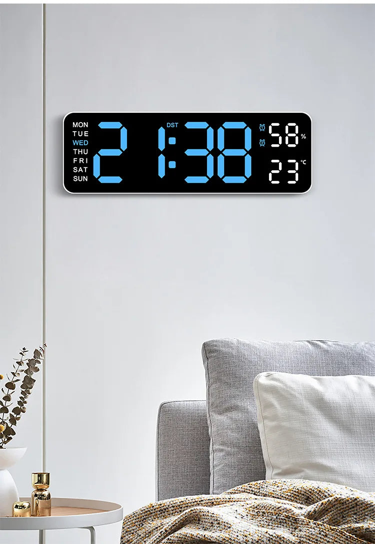 A digital wall clock displaying the time 2:13:38, day of the week, and temperature/humidity information.