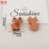 Two small, brown resin figurines shaped like deer or reindeer are displayed on a white background.