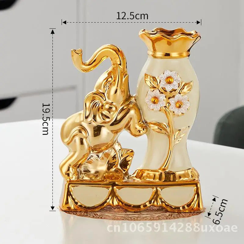 A pair of golden ceramic vases shaped like an elephant and a swan for modern home decor