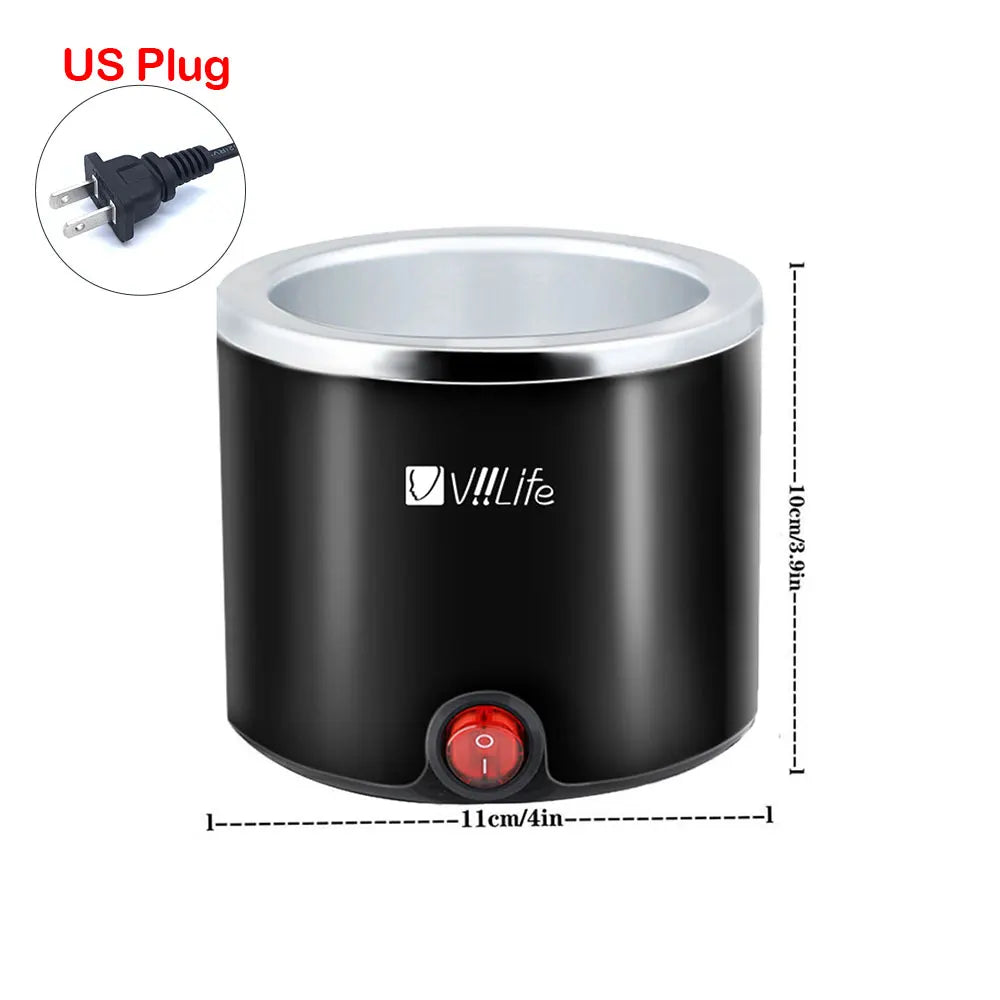 A black compact wax warmer with a silver rim and an included US plug.