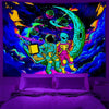 A vibrant tapestry featuring psychedelic alien imagery with neon colors against a dark background.