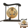 A black Feng Shui Zen table gong with a brass plate featuring dragon and Taiji symbols.