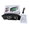 A black LED alarm clock with a digital display and power cord is shown next to its packaging box.