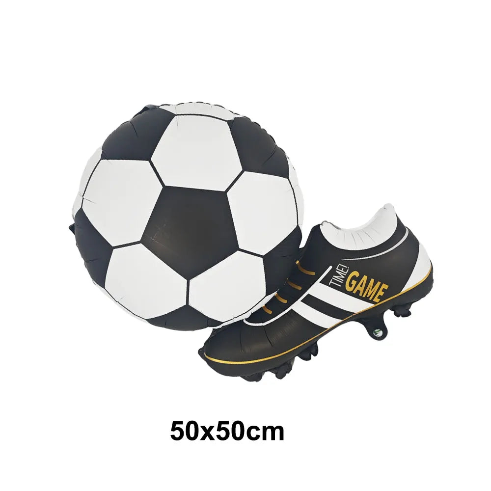 A white soccer ball and a black and white football-themed shoe are displayed on a white background.