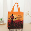 Orange Halloween themed gift tote bag featuring a spooky forest scene with bats and pumpkins.