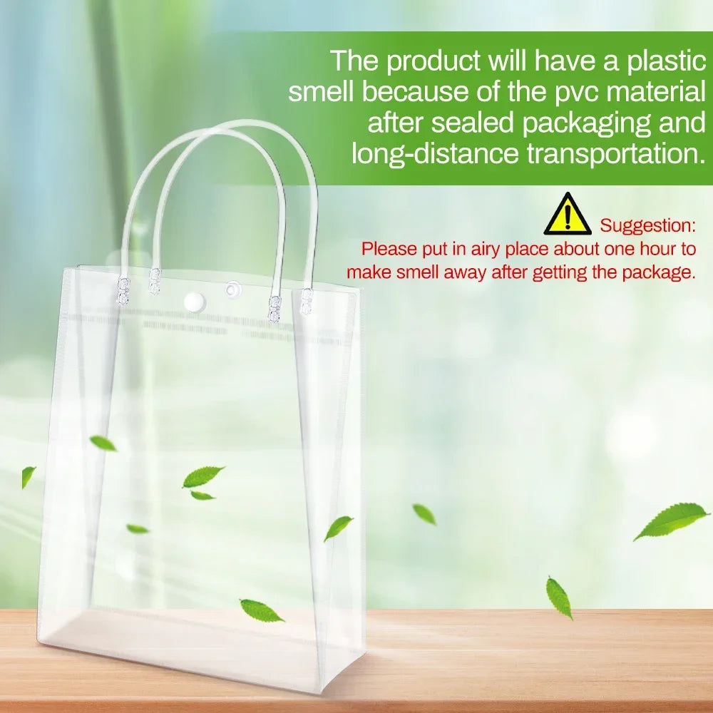 Clear reusable PVC gift bags with handles shown on a wooden surface.