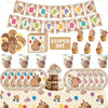 A set of happy capybara birthday party decorations including banners, cupcake toppers, and paper plates.
