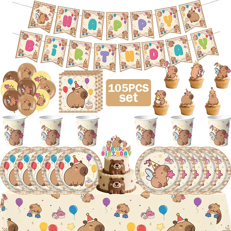 A set of happy capybara birthday party decorations including banners, cupcake toppers, and paper plates.