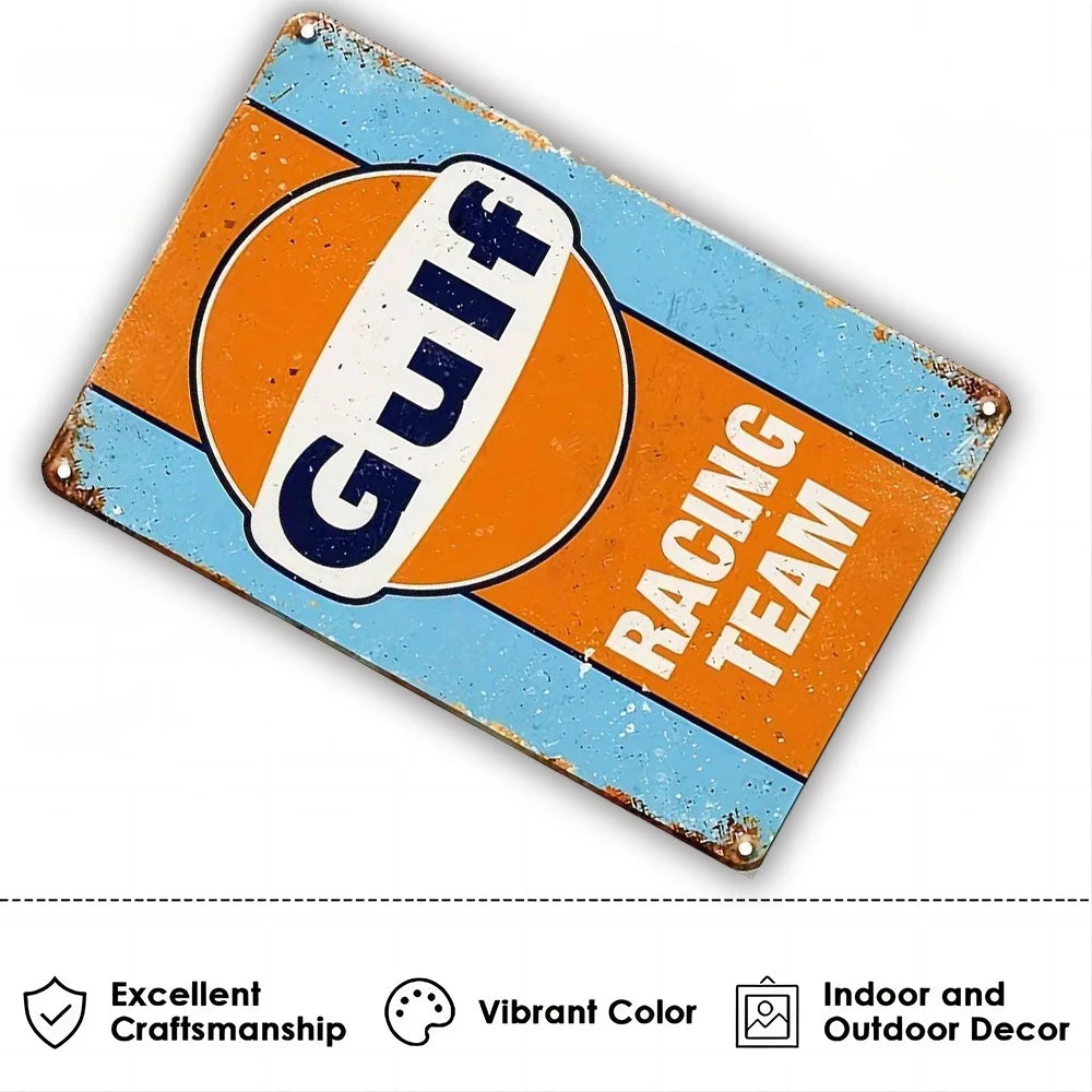 Vintage metal tin sign with orange and blue paint featuring the text GUIT surf racing team