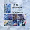 A pack of ultramarine gradient wash retro decorative paper sheets in various shades and textures.