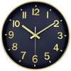 A dark blue wall clock with gold-colored hands and numerals, showing the time as approximately 1:30.