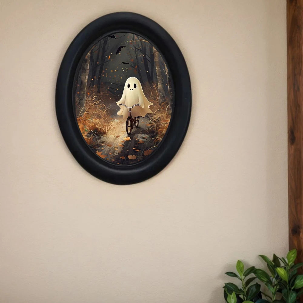Oval wooden wall art depicting a ghost riding a bicycle in a forest scene.