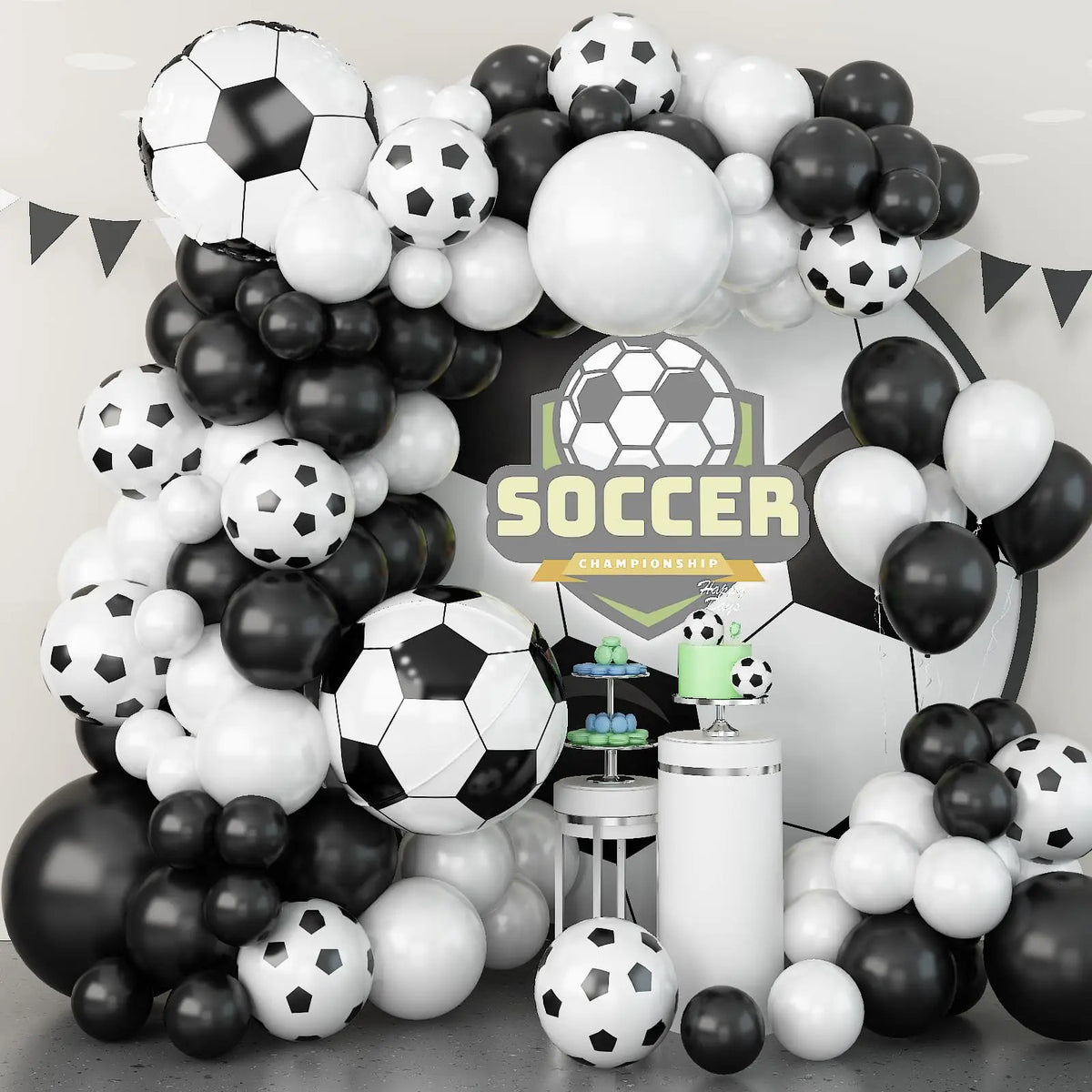 A balloon garland arch kit featuring black and white balloons for soccer-themed birthday party decorations.