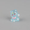 A small, translucent blue resin figurine of a cat with pink accents and a yellow crescent moon on its forehead.