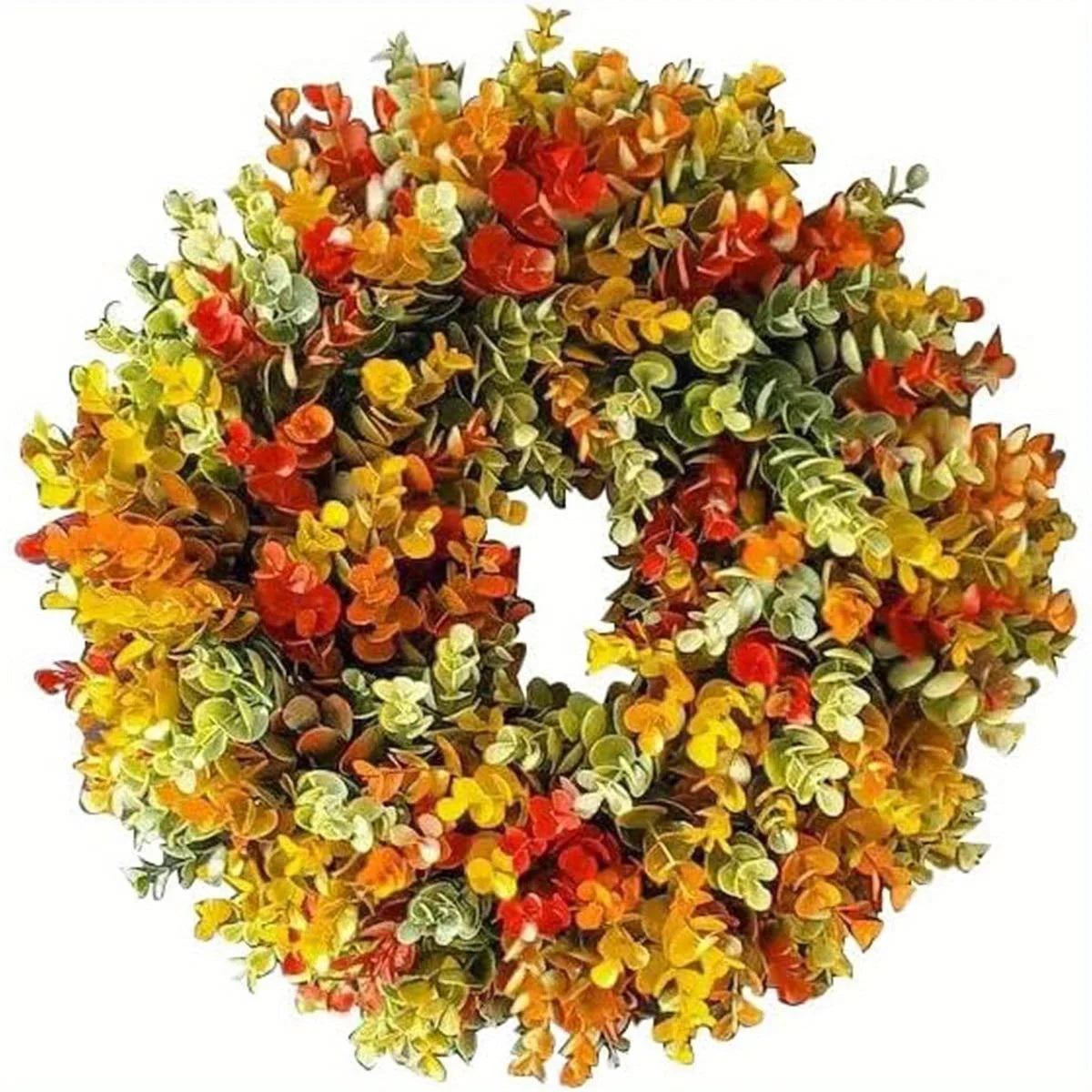 A dense wreath of artificial flowers in shades of orange, yellow, and green for home decor
