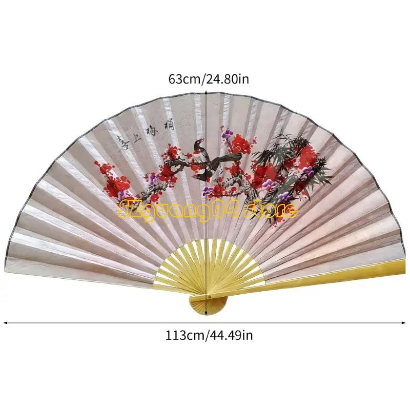 Large decorative Chinese theme wall fan with a light pink and gold color palette.