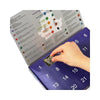 An open advent calendar featuring numbered slots with natural crystal gemstones and text about chakras.