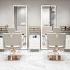 A modern salon setting featuring a full-length LED floor mirror and several stylish chairs with light gray upholstery.