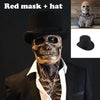 A realistic latex skull mask worn by a person, paired with a black hat and dark clothing.