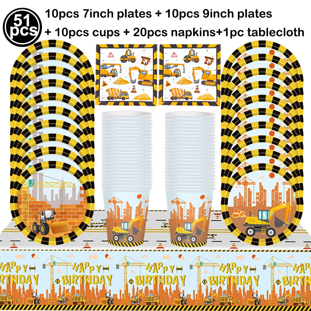 A set of construction vehicle themed birthday party tableware including plates, cups, napkins, and a tablecloth.