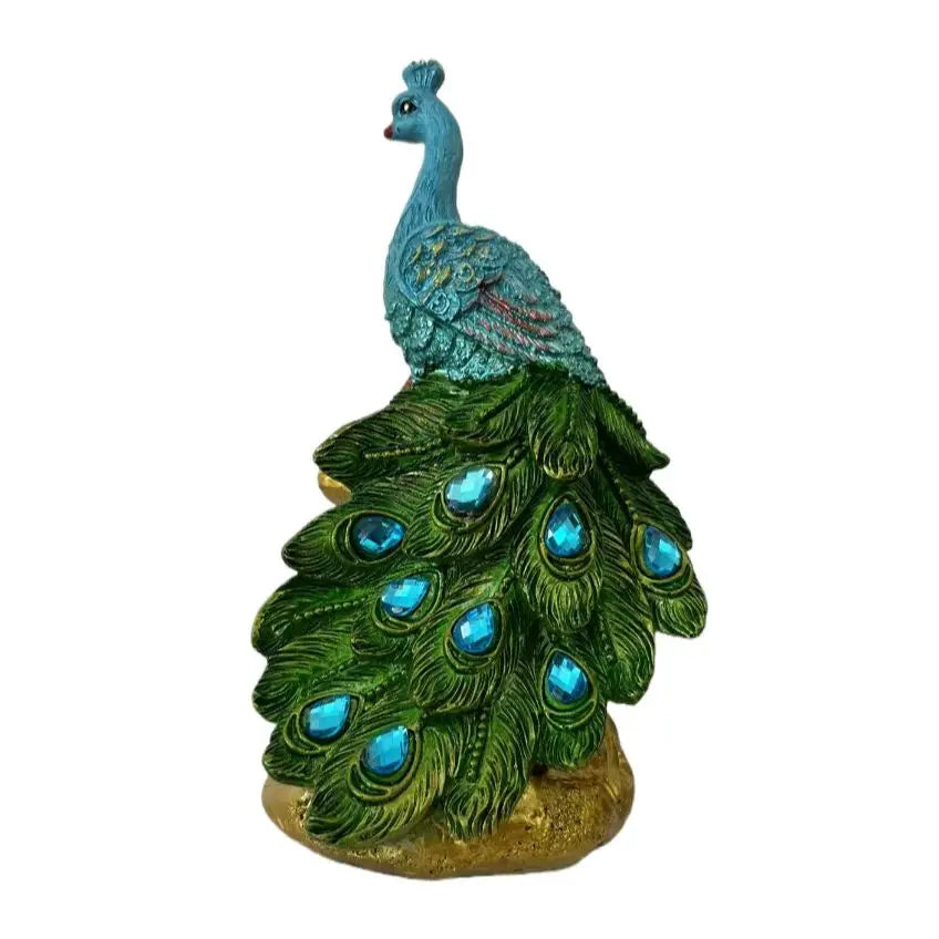 Elegant peacock statue with a blue head and green body featuring crystal tail feathers.