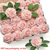 A box filled with pink foam rose flowers and green leaves for DIY bouquets and home decor