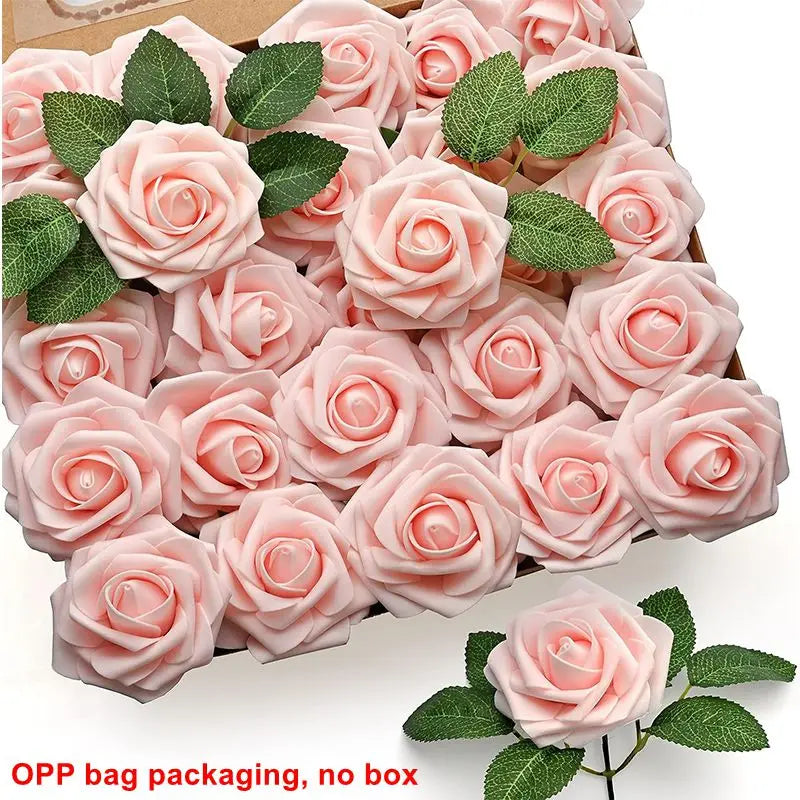 A box filled with pink foam rose flowers and green leaves for DIY bouquets and home decor