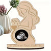 Wooden ultrasound photo frame featuring a silhouette of a pregnant woman and a heart, with a text banner reading Love at Firs