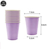 Ten purple disposable paper cups with light colored rims and lids.