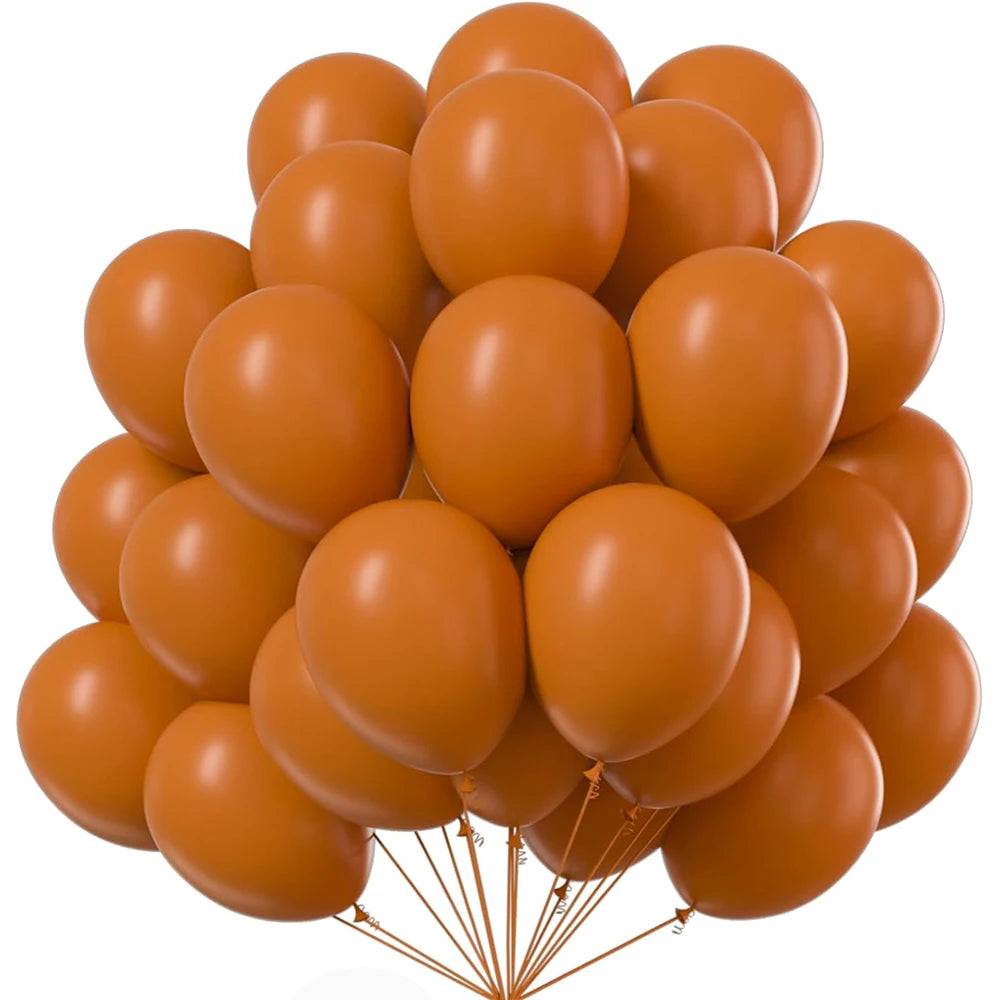 A bunch of orange latex balloons tied together for party or wedding decor