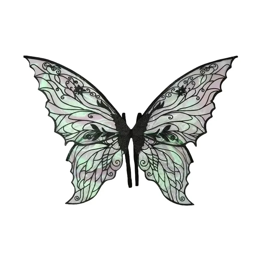 A pair of delicate, translucent green and purple fairy wings with intricate patterns.