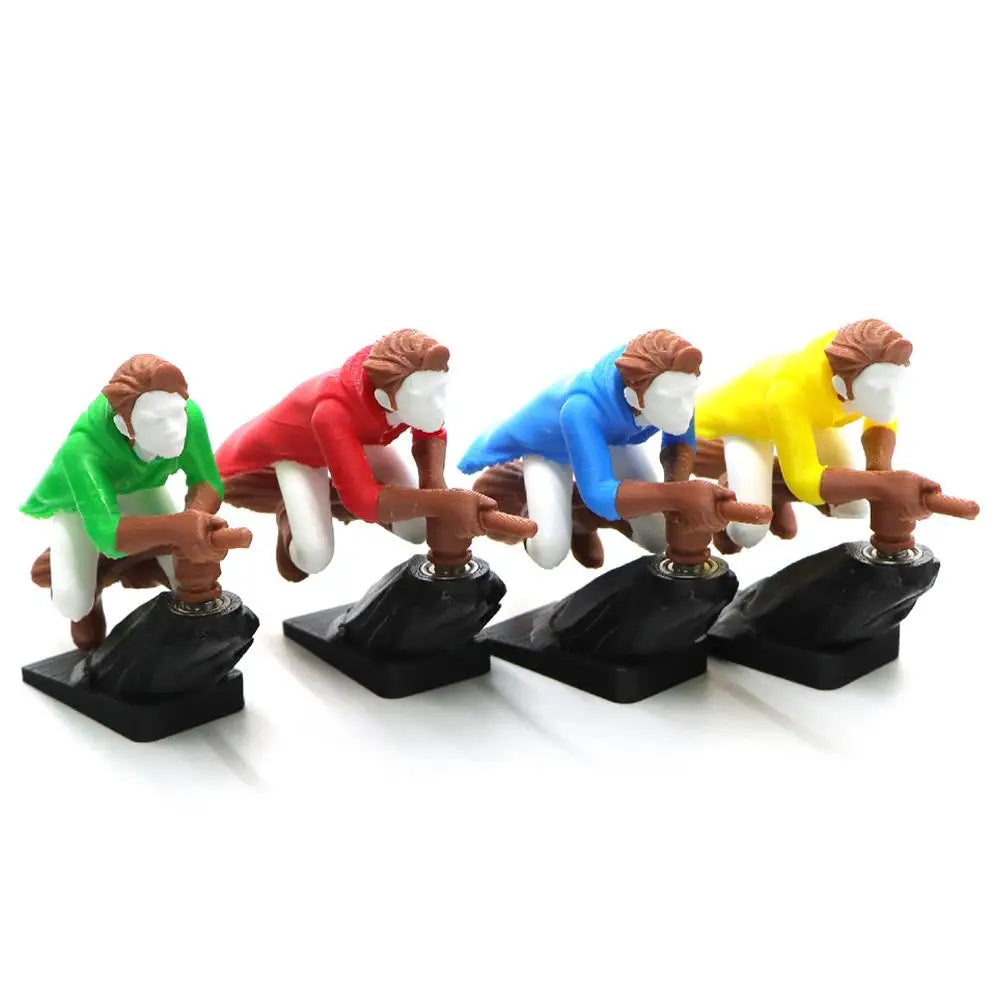 A set of five miniature figures depicting witches and wizards in various colored robes, used for dashboard decor.