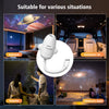 A white 2-in-1 projector and night light device shown in various contexts including a bedroom, automatic car, surprise, and c