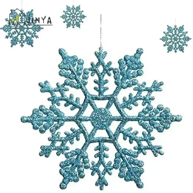 A set of six shimmering blue snowflake Christmas ornaments displayed against a white background.