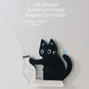 Black magnetic acrylic cat whiskered decoration mounted on a white base for fridge decor