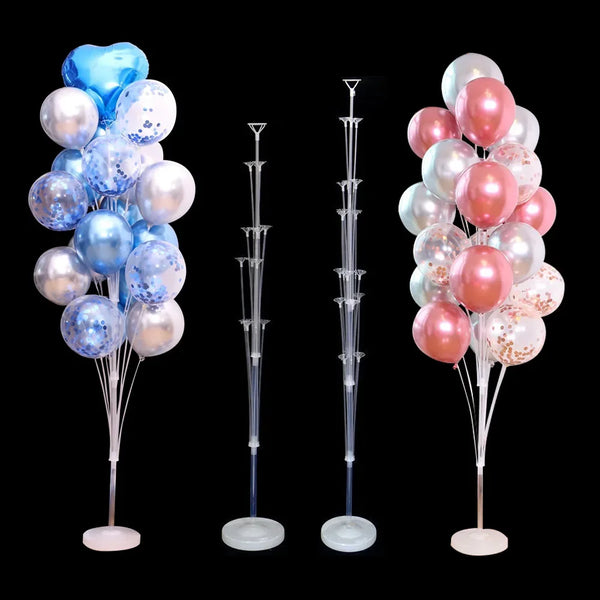 A set of blue and pink balloons displayed on a stand with a base and pole for party decorations.